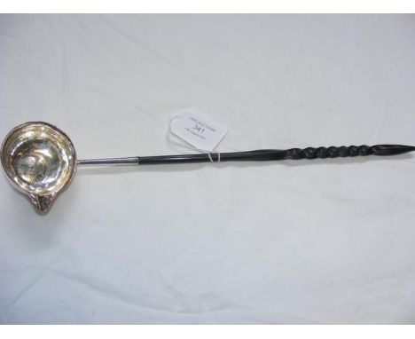 A toddy ladle with shaped bone handle