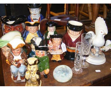 A cluster of character jugs and Foley china Isle of Wight ware etc