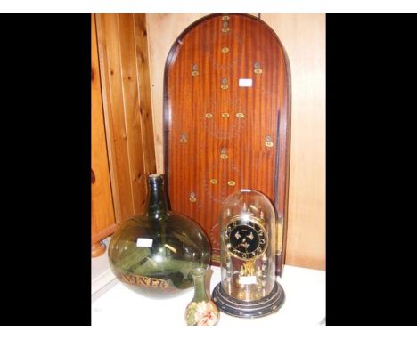 A Moorcroft pottery vase, vintage Bagatelle board, green Chemist's bottle, together with a mantel clock  