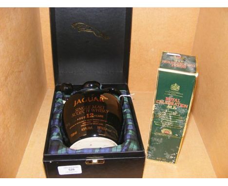 An unopened Jaguar Single Malt Scotch Whisky in presentation box, together with a Royal Celebration Ale 