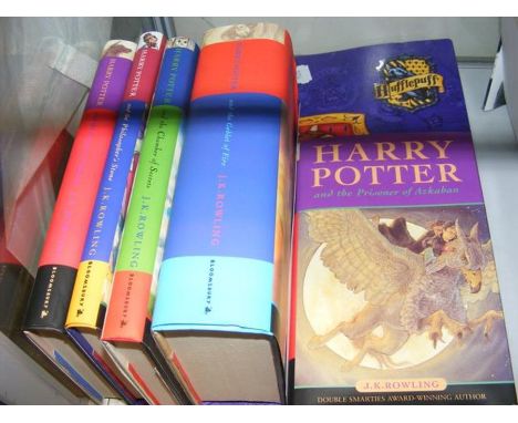 A collection of original cover Harry Potter hardback books with dust covers by J K Rowling, including Philosopher's Stone (12