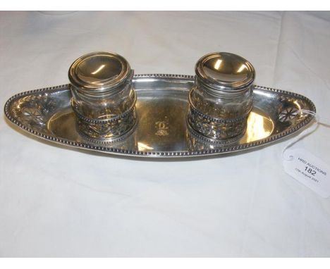 A silver and cut glass double inkwell stand CONDITION REPORTBy our judgement, condition of lot is good.Notably, the item spor