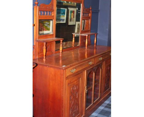 EDWARDIAN CARVED LIGHT MAHOGANY MIRROR-BACKED SIDEBOARD
gallery with large central mirror, two drawers over three cabinets, c