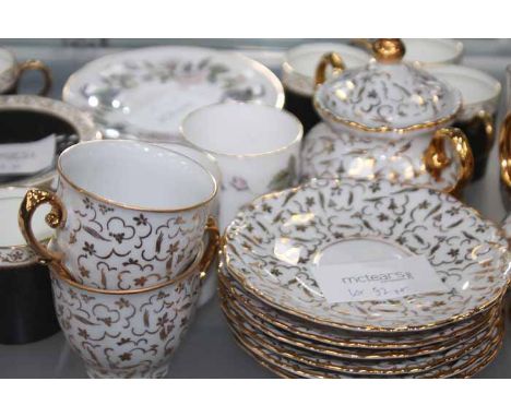 SIX ROYAL WORCESTER COFFEE CUPS AND SIX SAUCERS
together with two other part coffee sets