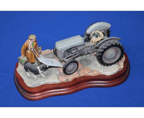 BORDER FINE ARTS STYLE GROUP OF A FARMER, DOG AND TRACTOR