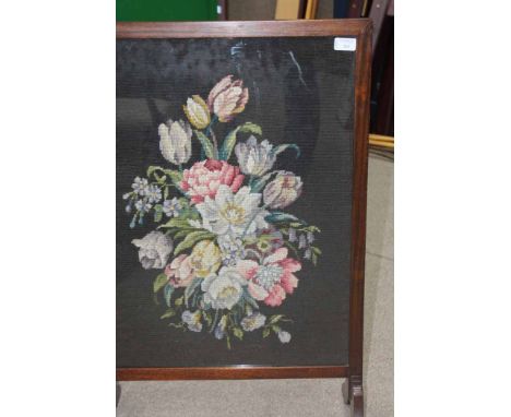 OAK FRAMED WOOLWORK FIRE SCREEN
depicting a floral still life, 85cm high