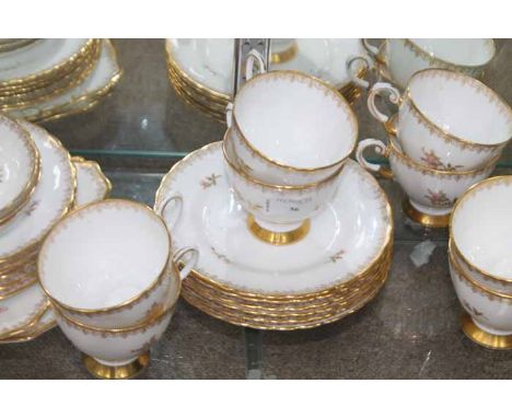 TUSCAN FINE BONE CHINA TEA SERVICE
decorated with rose motifs and gilt highlights; together with a Colclough tea service, pat