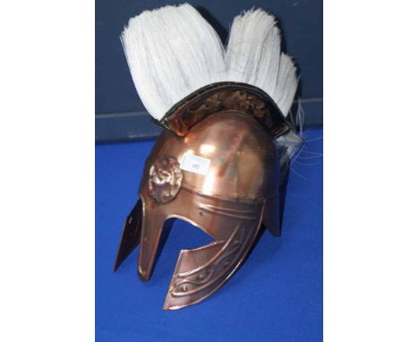 NOVELTY GRECIAN SOLDIER COSTUME
made out of copper coloured metal plates, including breast plate, helmet, two leg guards and 