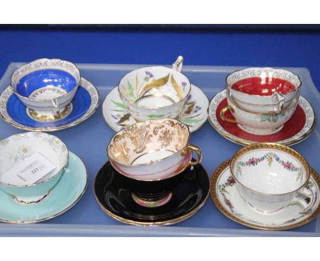 EIGHT TEA CUPS AND SAUCERS
including Paragon, gilt examples, Royal Chelsea etc