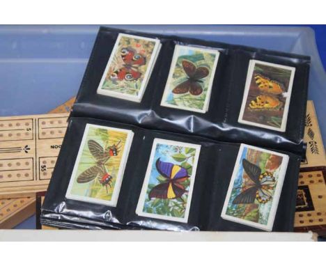 COLLECTION OF CIGARETTE CARDS AND VINTAGE GAMES
including a "Black & White" domino set, cribbage boards, etc