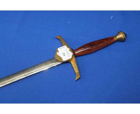 WILKINSON SWORD COMMEMORATIVE SWORD
sword cutlers to Her Majesty, with bass and hardwood handle, etched blade with floral scr