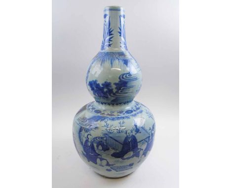 CHINESE BLUE AND WHITE CERAMIC DOUBLE GOURD VASE, decorated figures in a landscape, 65cm H.