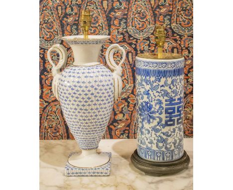 LAMPS, on a Chinese ceramic, blue and white brush jar, 40cm H together with a blue and white gilt line urn shaped lamp, in th