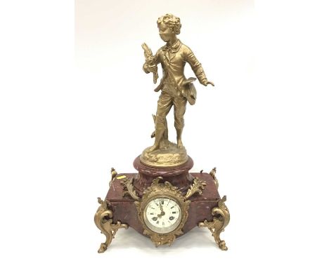 French figural spelter and rouge marble mantel clock, circa 1900, signed Brouchon, 56cm height, key and pendulum included