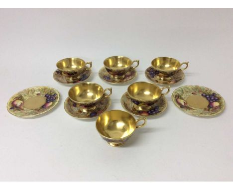 Aynsley Orchard Gold tea wares, including six cups, five saucers and two side plates, signed by D. Jones and N. BruntConditio