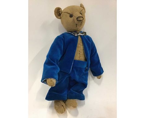 Early Steiff Bear, small size with boot button eyes, thin shaved snout and long tapering limbs. Hole in left ear where but no
