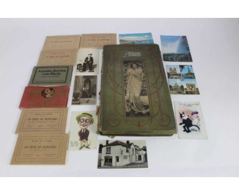 Collection of postcards in album and loose including Charlie Chaplin, comic, novelty, artist drawn A R Quinton, real photogra