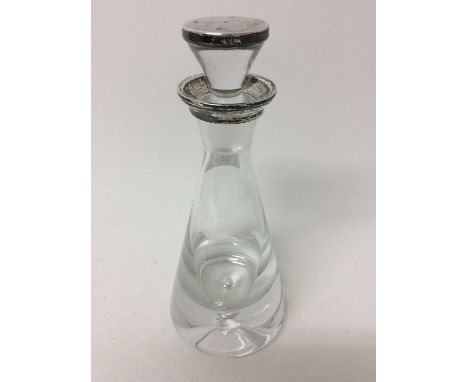 Glass spirit decanter with silver mounts, Millennium hallmarks (Birmingham 2000)