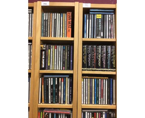 Two racks of Jazz CDs including Stan Getz, Eddie Davis, Wild Bill Davis and Duke EllingtonCondition report: Based on examinin