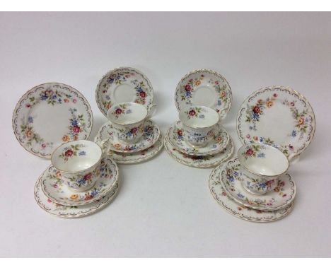 Royal Albert Jubilee Rose pattern tea set comprising four tea cups, six saucers and six tea platesCondition report: All piece