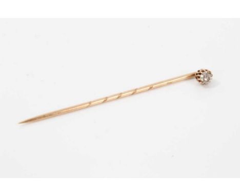 Diamond set gold stick pin with a single old cut diamond estimated to weigh approximately 0.15cts, in 14ct gold setting with 