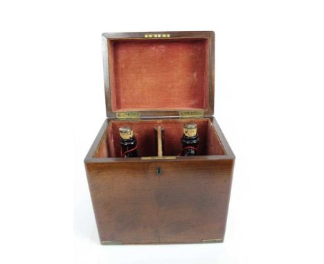 Victorian mahogany decanter box, the red velvet interior containing two amber glass decanters, 23.5cm height