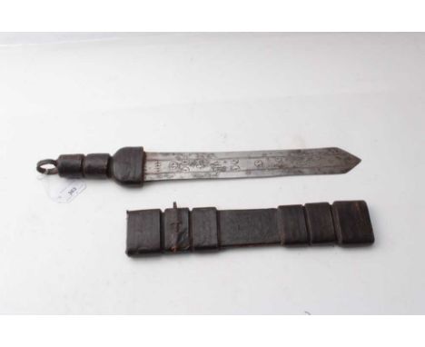 African short sword with tooled leather hilt and scabbard