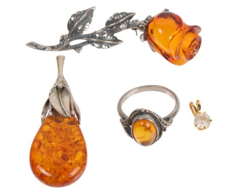 Various silver and amber jewellery, including rose brooch, ring, etc, 15.6g gross (4) . Condition Report:Lot sold as seen unl
