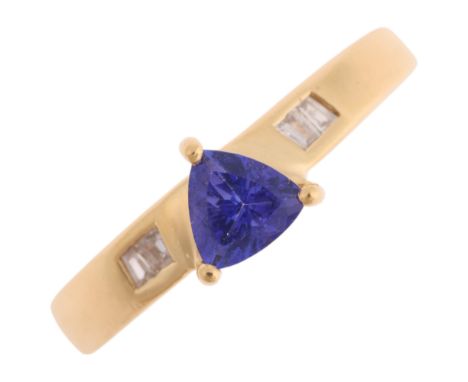 An 18ct gold tanzanite and diamond ring, by Iliana, set with trilliant-cut tanzanite and tapered baguette-cut diamond shoulde