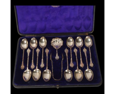 12 Victorian silver teaspoons with tea caddy spoon and sugar tongs, by Spinks, London 1867, twisted stems with foliate decora
