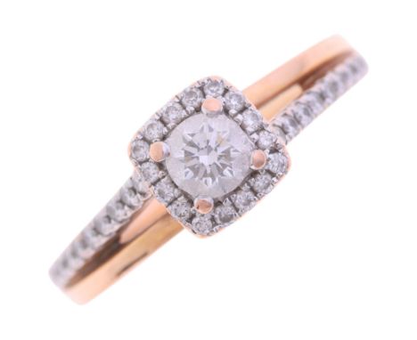 An 18ct rose gold diamond halo cluster ring, set with 0.25 modern round brilliant-cut diamond surrounded by halo cluster roun
