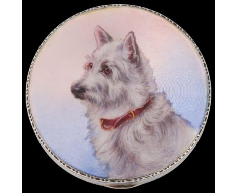 An Art Deco Continental sterling silver enamel Yorkshire Terrier powder compact, import London 1928, circular form, with hand
