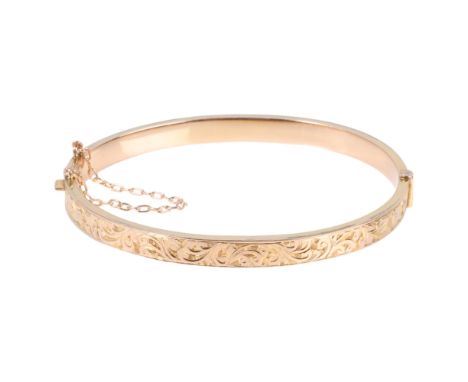 An Antique 9ct rose gold hinged bangle, indistinct maker, Birmingham 1907, foliate engraved decoration, band width 5.4mm, int