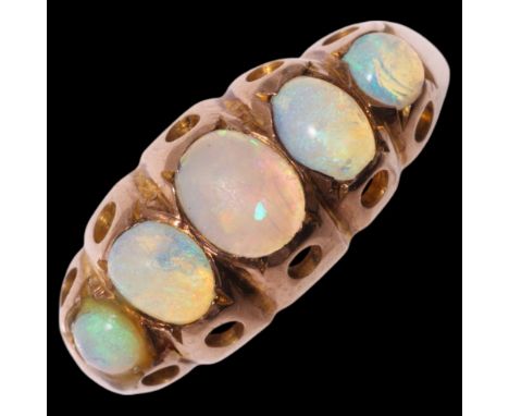 An Antique 9ct gold graduated five stone opal half hoop ring, Nathan Brothers, indistinct Birmingham date letter, set with ov