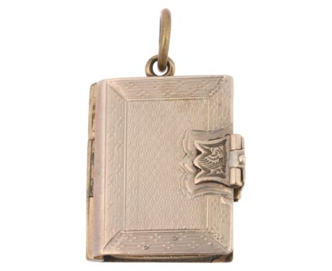 An Antique Victorian gold plated 'Book' photo locket, engine turned decoration, 25mm, 5.7g . Condition Report:No damage or re