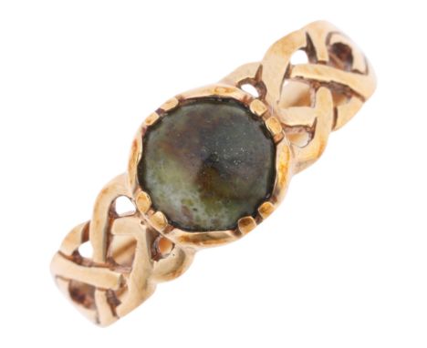 An Irish 9ct gold Connemara marble ring, maker FNM, with Celtic knot pierced shoulders, setting height 7.7mm, size P, 2.1g . 
