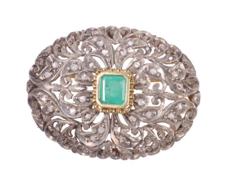 A French emerald and diamond oval bombe brooch, with central emerald step-cut emerald and pierced rose-cut diamond foliate su