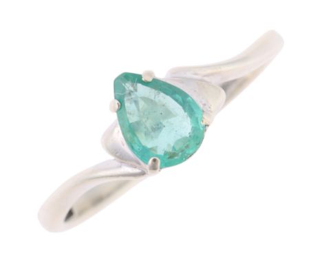 A 9ct white gold single stone emerald ring, maker DK, Birmingham 2006, claw set with pear-cut emerald, setting height 6.5mm, 