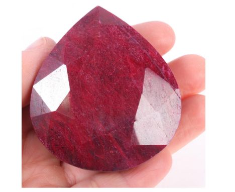 A 750.20ct unmounted pear mixed-cut ruby, 26.31 x 51.72 x 57.77mm, evidence of colour treatment, with IDT gemstone report . C