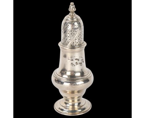 A George III silver sugar caster, John Delmester, London 1762, plain baluster form, with spiral cover and acorn finial, 13cm,