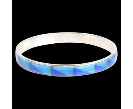 A Continental silver and blue enamel slave bangle, unmarked and tests as silver, band width 8.1mm, internal circumference 20c