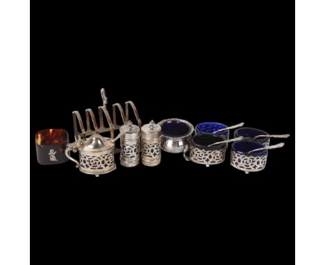 Various silver, including 5-bar toast rack, set of 4 salt cellars with blue glass liners, etc, 4.5oz weighable1 bulbous salt 