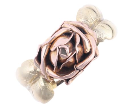 A French 14ct two-colour gold rose flowerhead ring, maker AG, with leaf shoulders, setting height 8.9mm, size P, 3g . Conditi