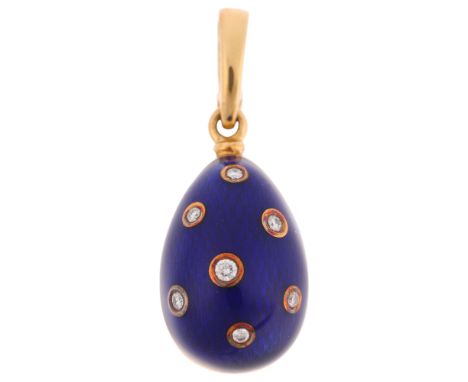 FABERGE - an 18ct gold blue enamel and diamond egg pendant, with engine turned blue guilloche enamel ground, set with modern 