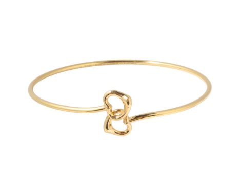TIFFANY & CO - an 18ct gold Double Open Heart bangle, designed by Elsa Peretti, London 2004, signed Tiffany & Co Spain, heart
