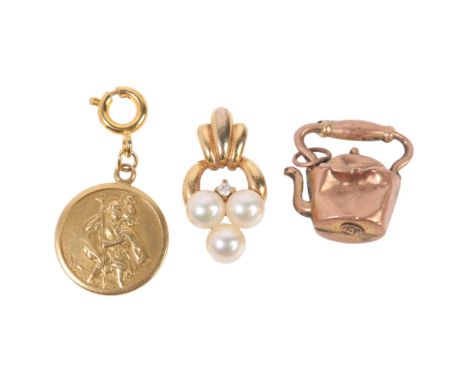 Various gold jewellery, comprising 18ct St Christopher charm, 1.9g, and 2 x 9ct gold pendant, 2.2g gross (3) . Condition Repo