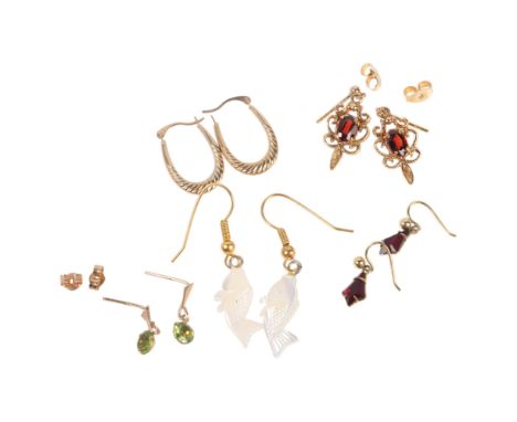 Various 9ct gold earrings, including mother-of-pearl fish examples, 6.3g gross . Condition Report:Lot sold as seen unless spe