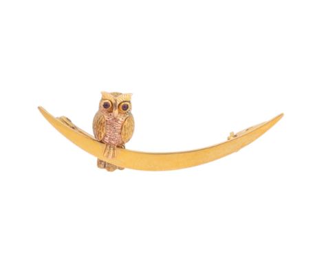 An Antique Victorian 9ct gold 'Owl And Crescent Moon' brooch, circa 1890, realistically modelled as a two-colour gold owl wit