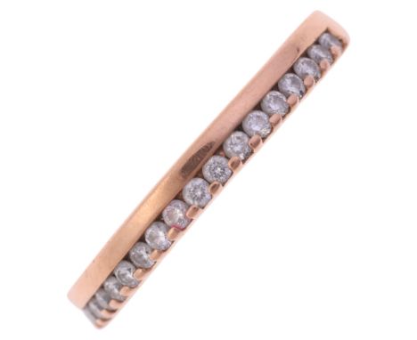 An 18ct rose gold diamond half eternity band ring, maker GX, set with modern round brilliant-cut diamonds, total diamond cont
