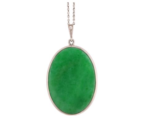 An Art Deco jade and diamond panel pendant necklace, set with polished oval flat-top jade plaque, within platinum frame havin